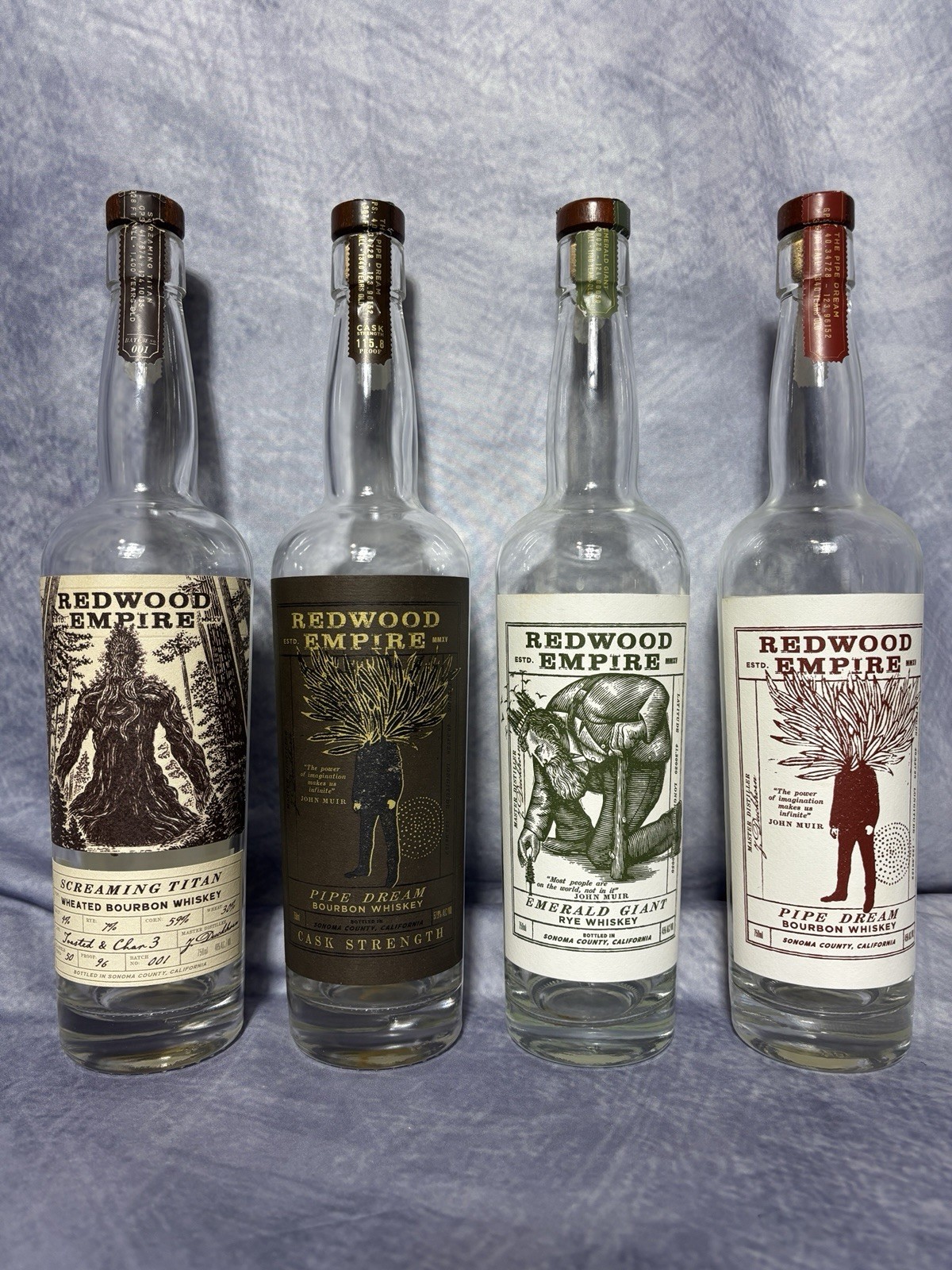 Redwood Empire Lot of 4 Whiskey Bourbon Rye Decorative Decanter Bottles