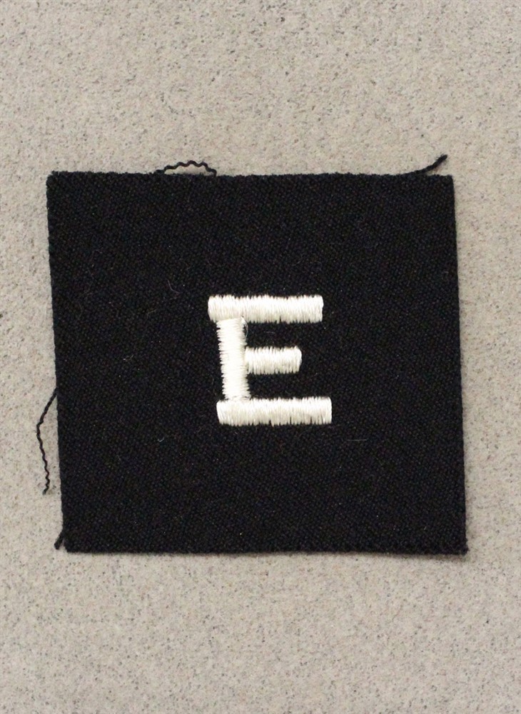 USN Navy Distinguishing Mark 1125: Navy "E" - white on navy blue