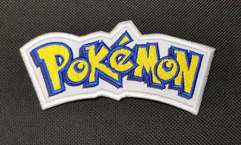Pokemon Logo Embroidered Patch approx 1.75x4.25"