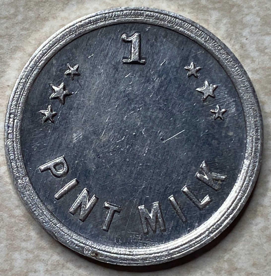 T9281 1 Pint Milk, Unknown  Anillo Restrike Arcade Token