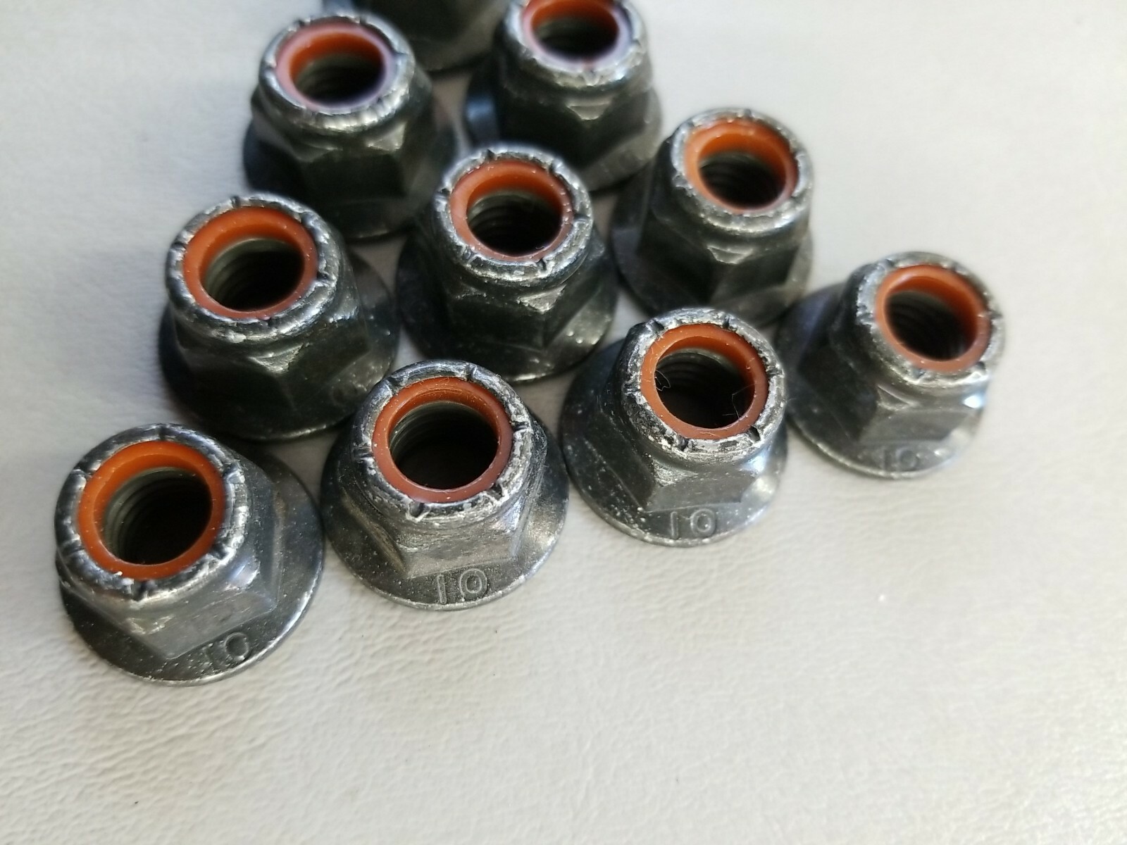 (10) M10x1.5 Hex Flange, Nylon Insert Lock Nuts CL10.9 Black Zinc