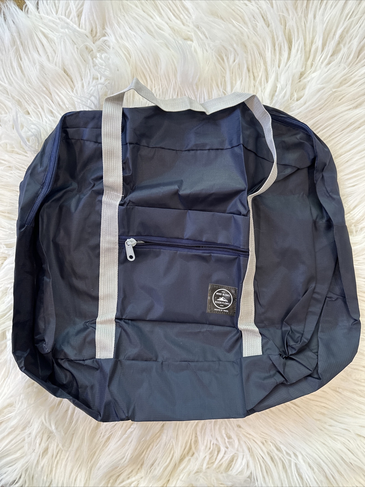 Wind Blows River Flows-Foldable Travel Bag - Black New - Hangs On Luggage