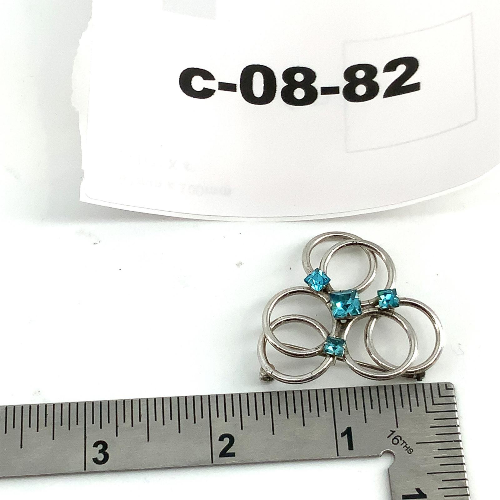 Vintage Silvertone Blue Crystal Mid Century Brooch Interlocking Circle Pin