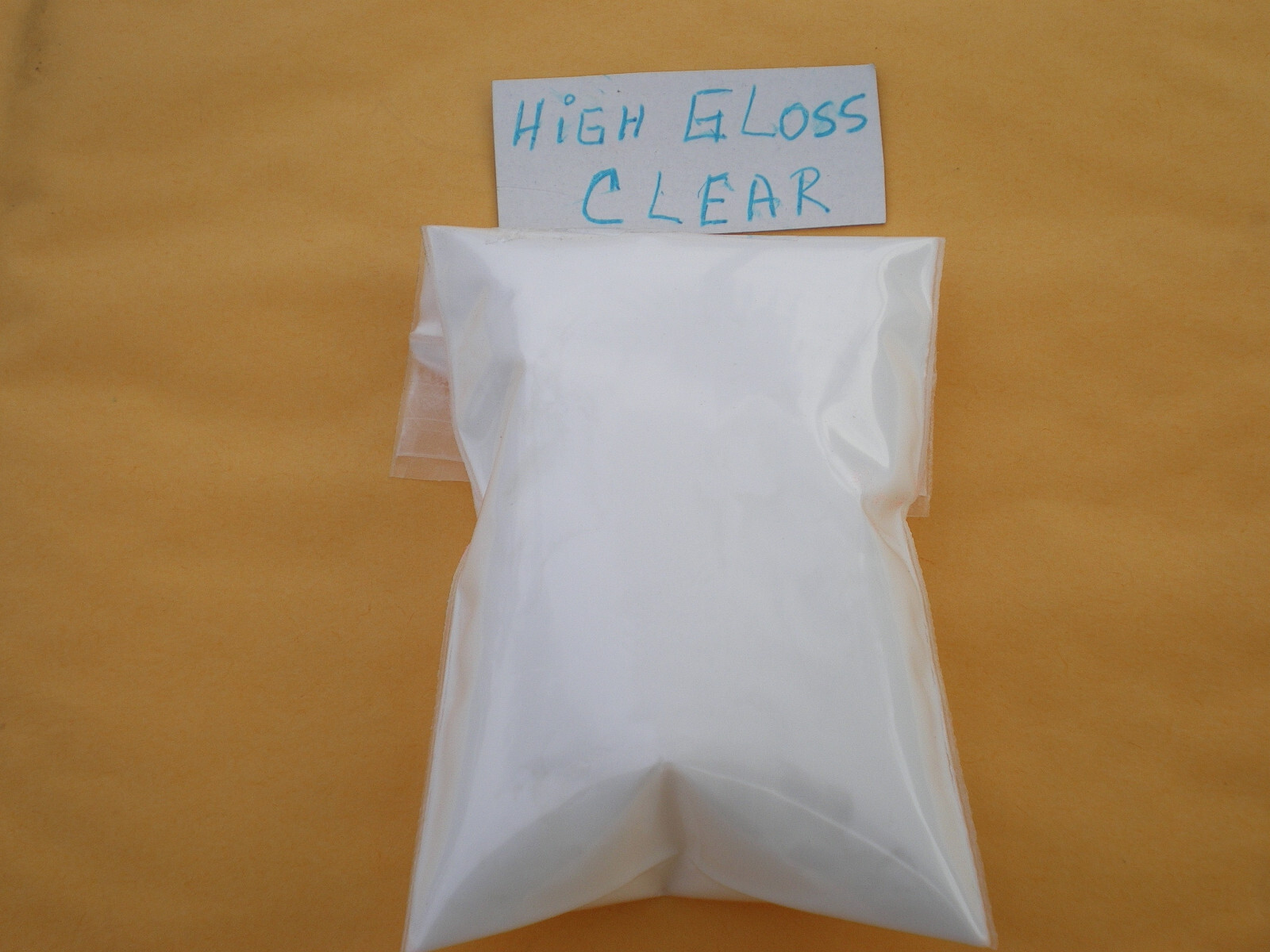POWDER JIG PAINT, 3 OZ. RESEALABLE BAG, HIGH GLOSS CLEAR