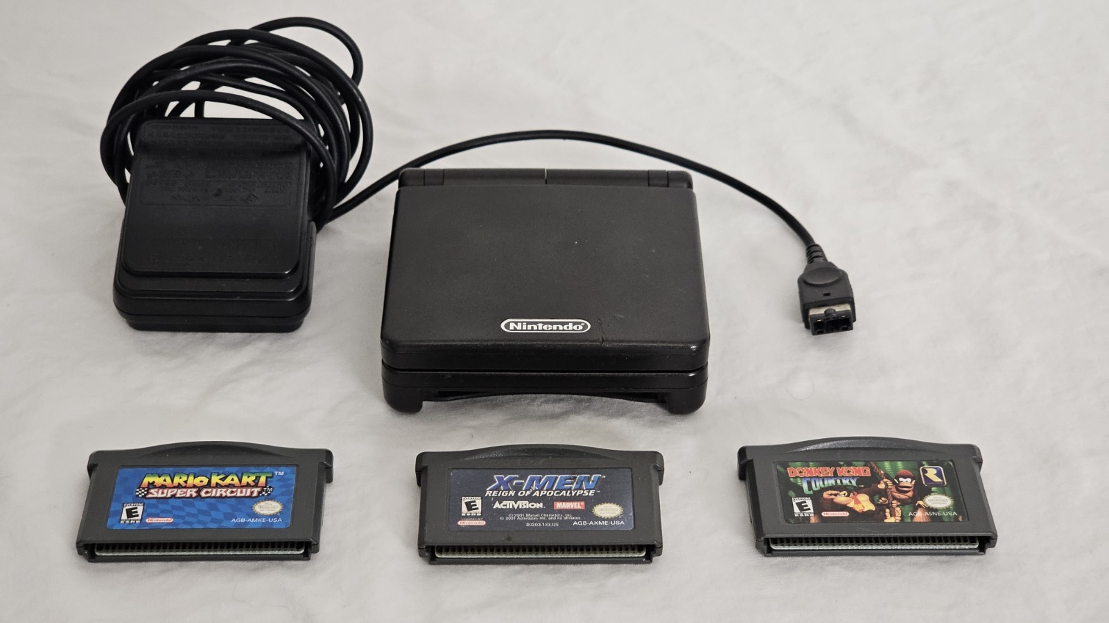Nintendo Gameboy Advance SP with 3 games and Xbox controler case