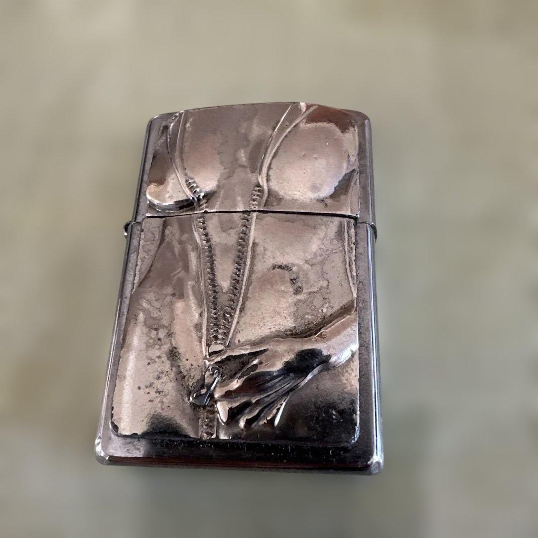 Zippo Item ZIPPO lighter with 'Zipper Girl' emblem
