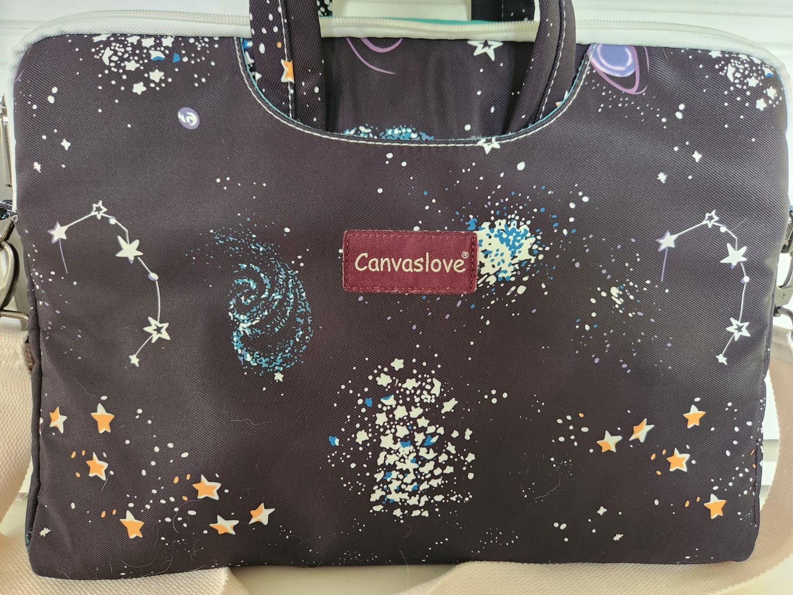 Canvaslove brand bag is a stylish laptop carrying electronic devices