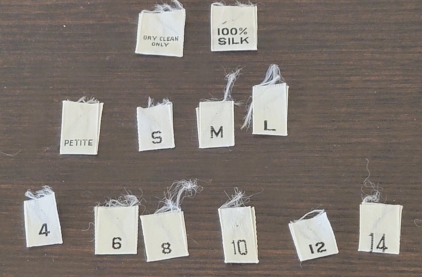 Woven sewing fabric labels. P, S, M, L, 4,6,8,10,12,14, 100% silk, dry clean
