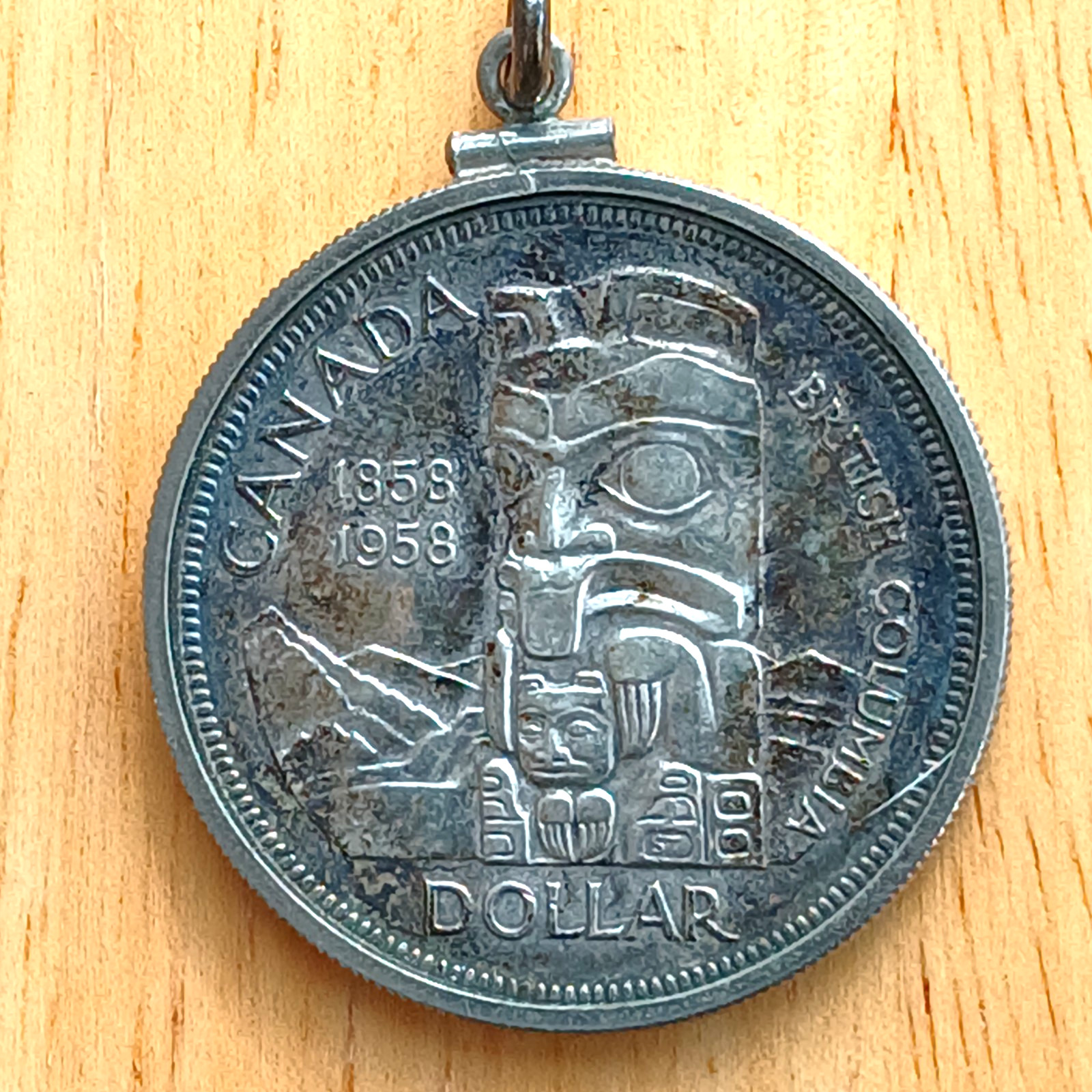 1958 Silver Totem Pole Canada Dollar in Bezel Pendant