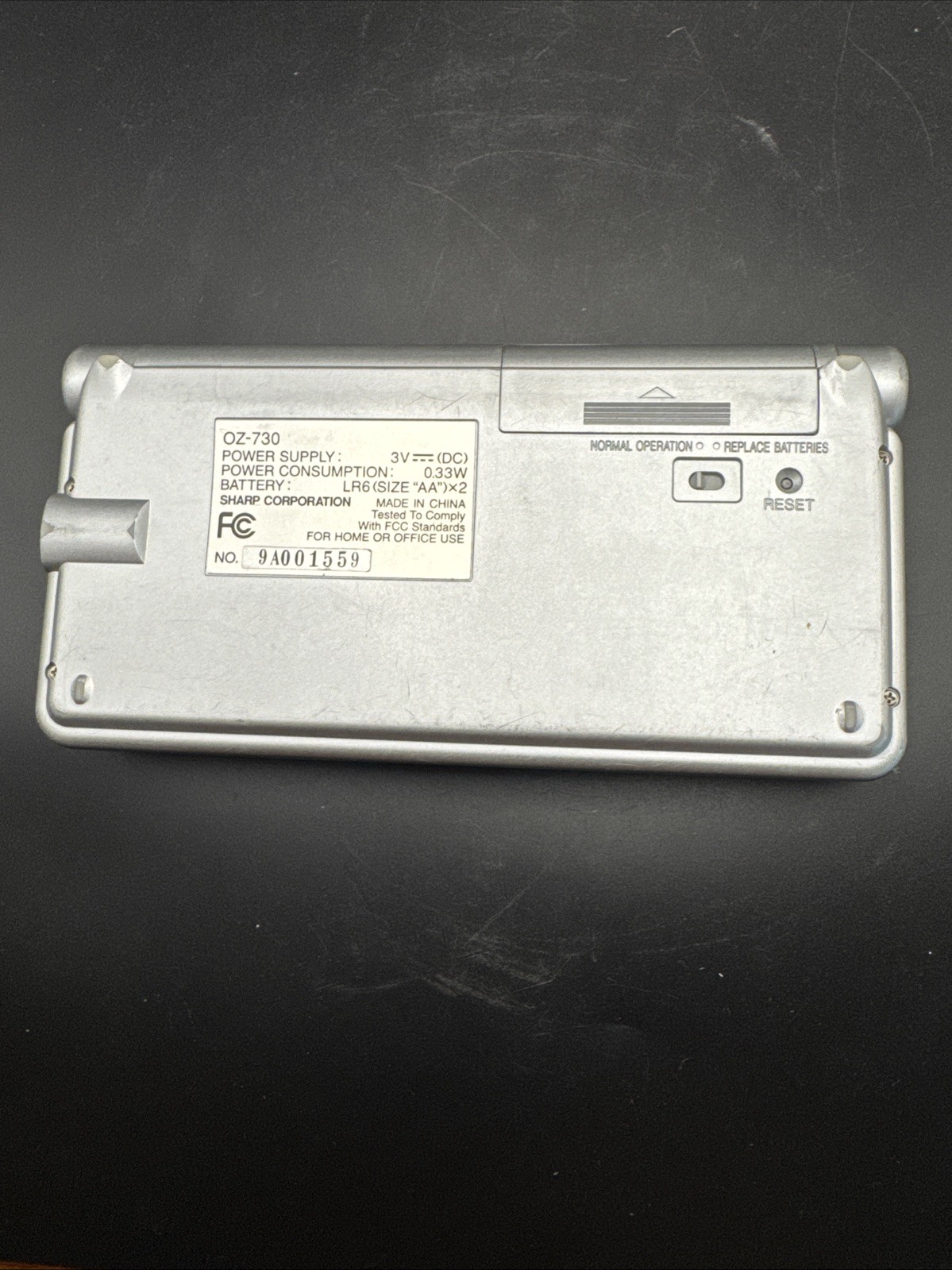 Vintage Sharp Wizard OZ-730 Silver Handheld Portable Electronic Organizer