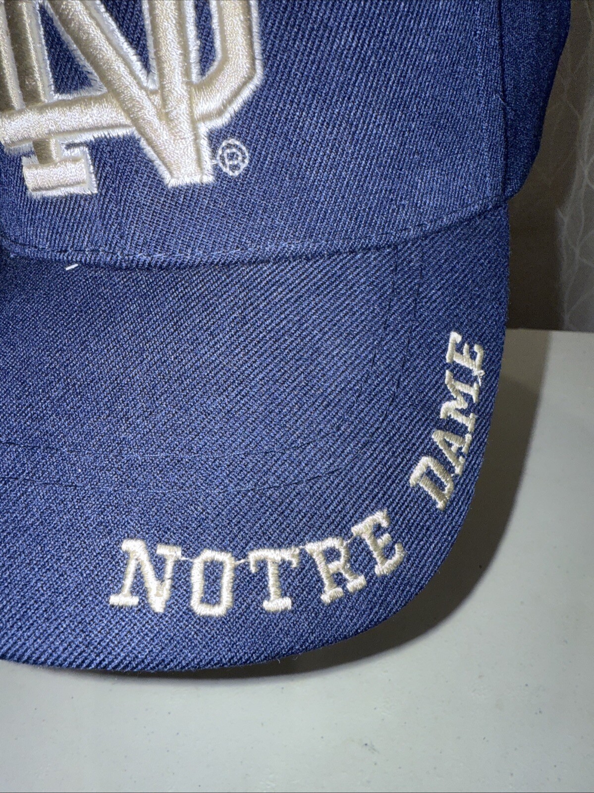 Notre Dame Interlock ND in White Silver on Navy Hat Cap Cotton Hook Loop EUC
