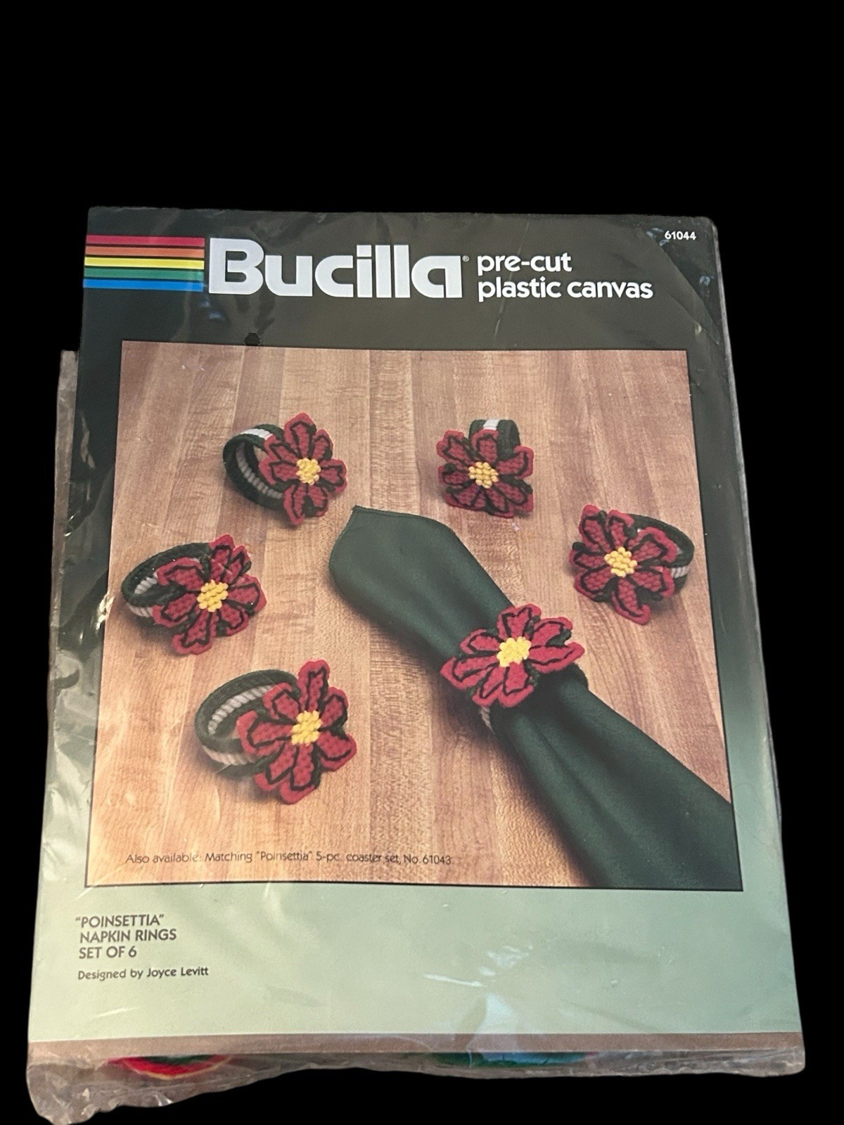Bucilla Pre-Cut Plastic Canvas Set of 6 Poinsettia Napkin Rings 61044 Holiday