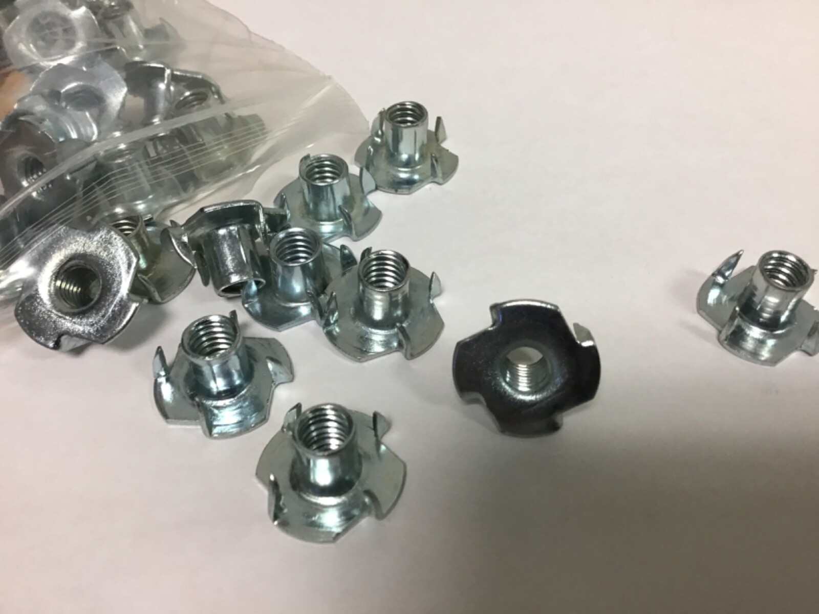 New Qty (50) 5/16-18 X 7/16" Long, 4 Prong Tee Nuts