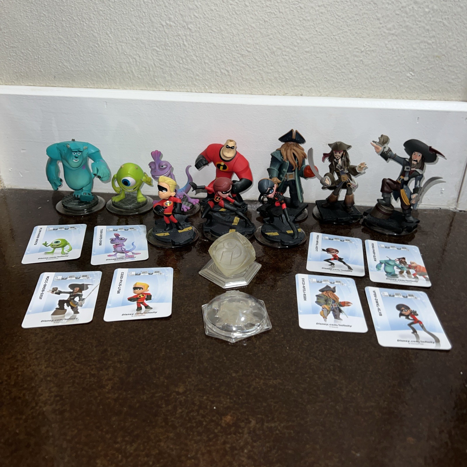 Disney infinity 11figures Lot Incredibles Monsters Inc Pirates Of The Caribbean
