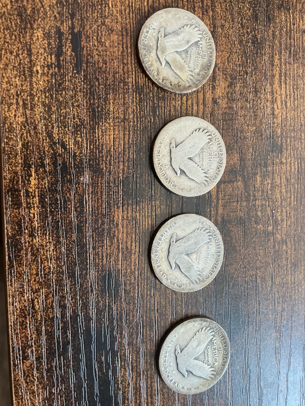 (4) 1927 Liberty Standing Quarters