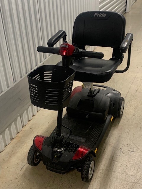 Pride Go-Go Traveler Elite, 4-wheel mobility scooter.  Red. New Batteries.