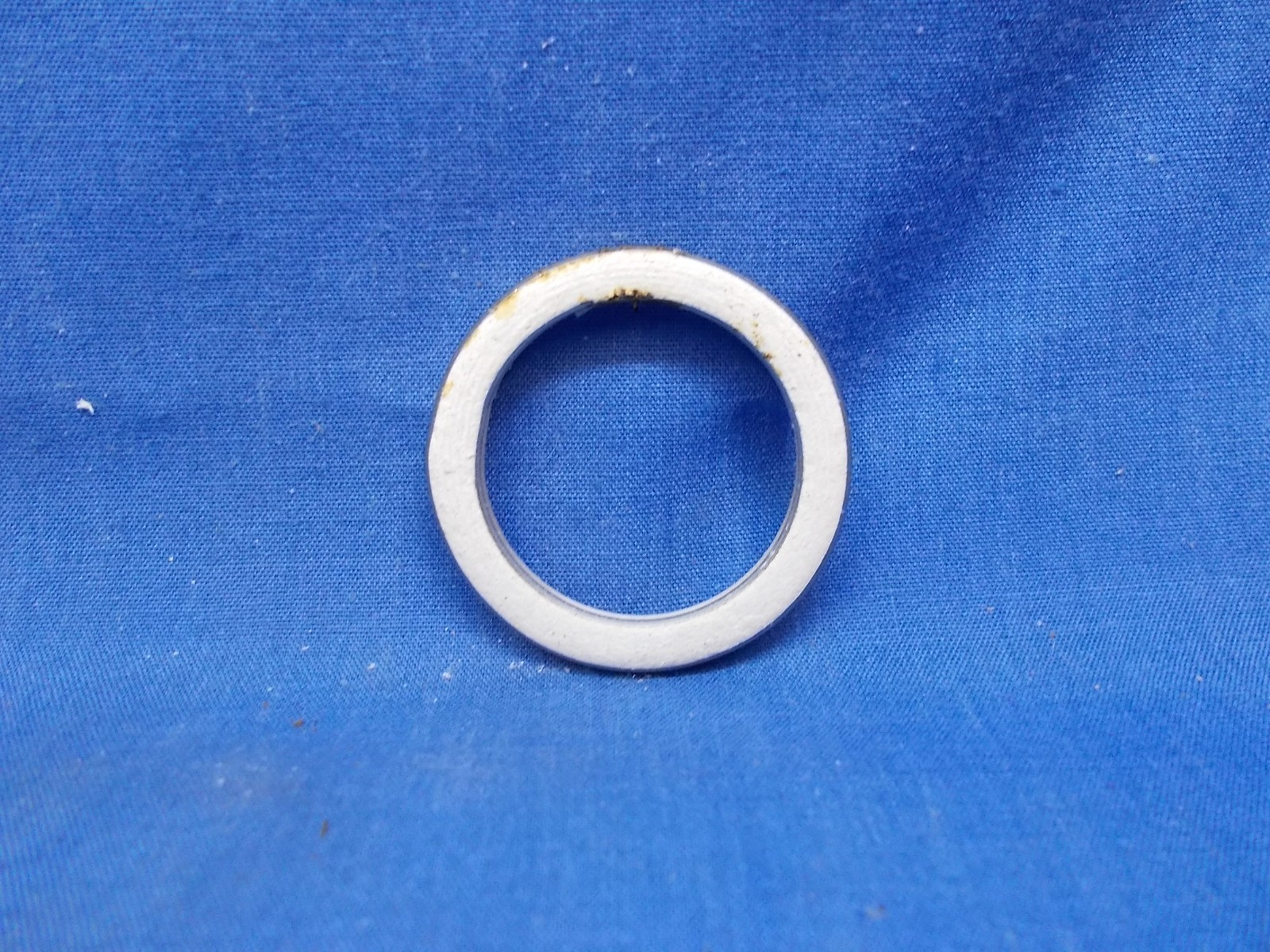 Yamaha 24G-14613-00. OEM Exhaust Gasket. Fits Yamaha CE50 CW50 CY50 SH50 CG50.