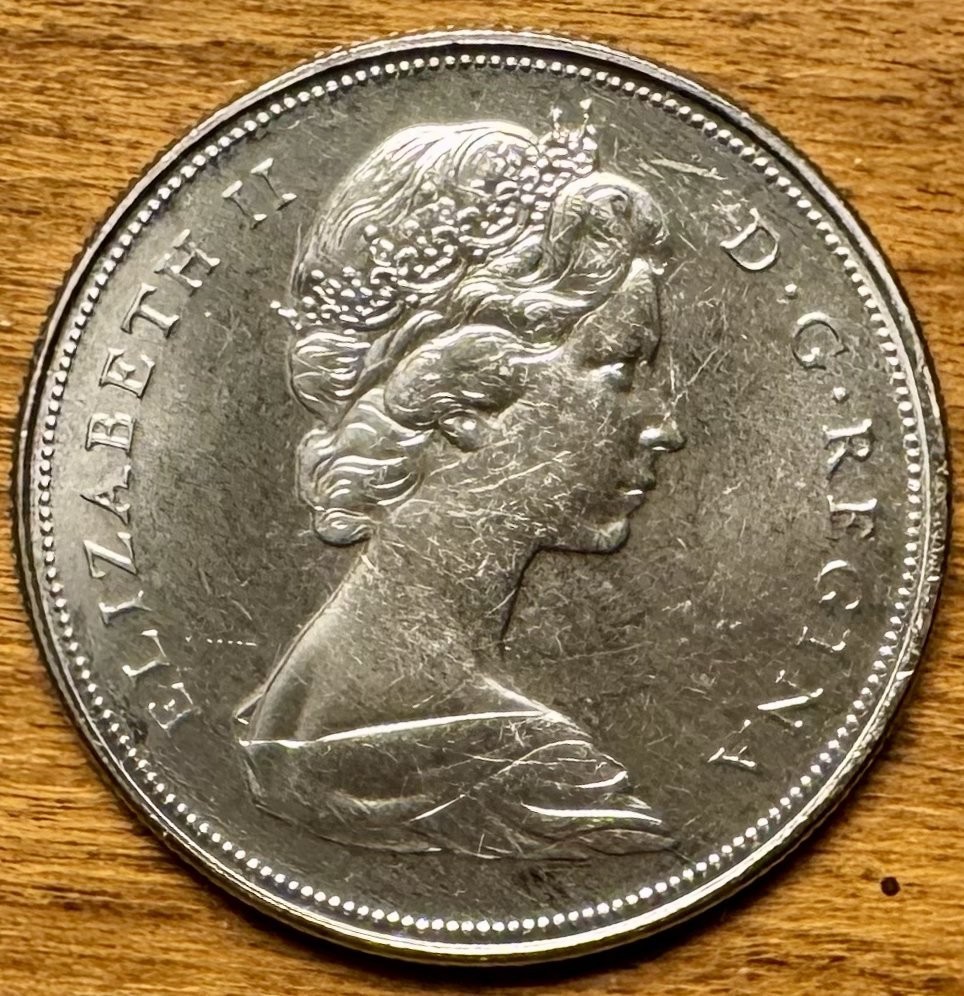1968 Canadian Voyager Dollar Coin - Small Island, Extra Waterline Variety