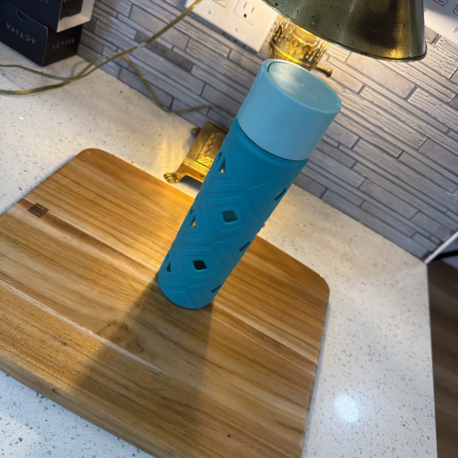 Lululemon 22 oz Glass Water Bottle with Green Silicone Sleeve Yoga Screw Lid