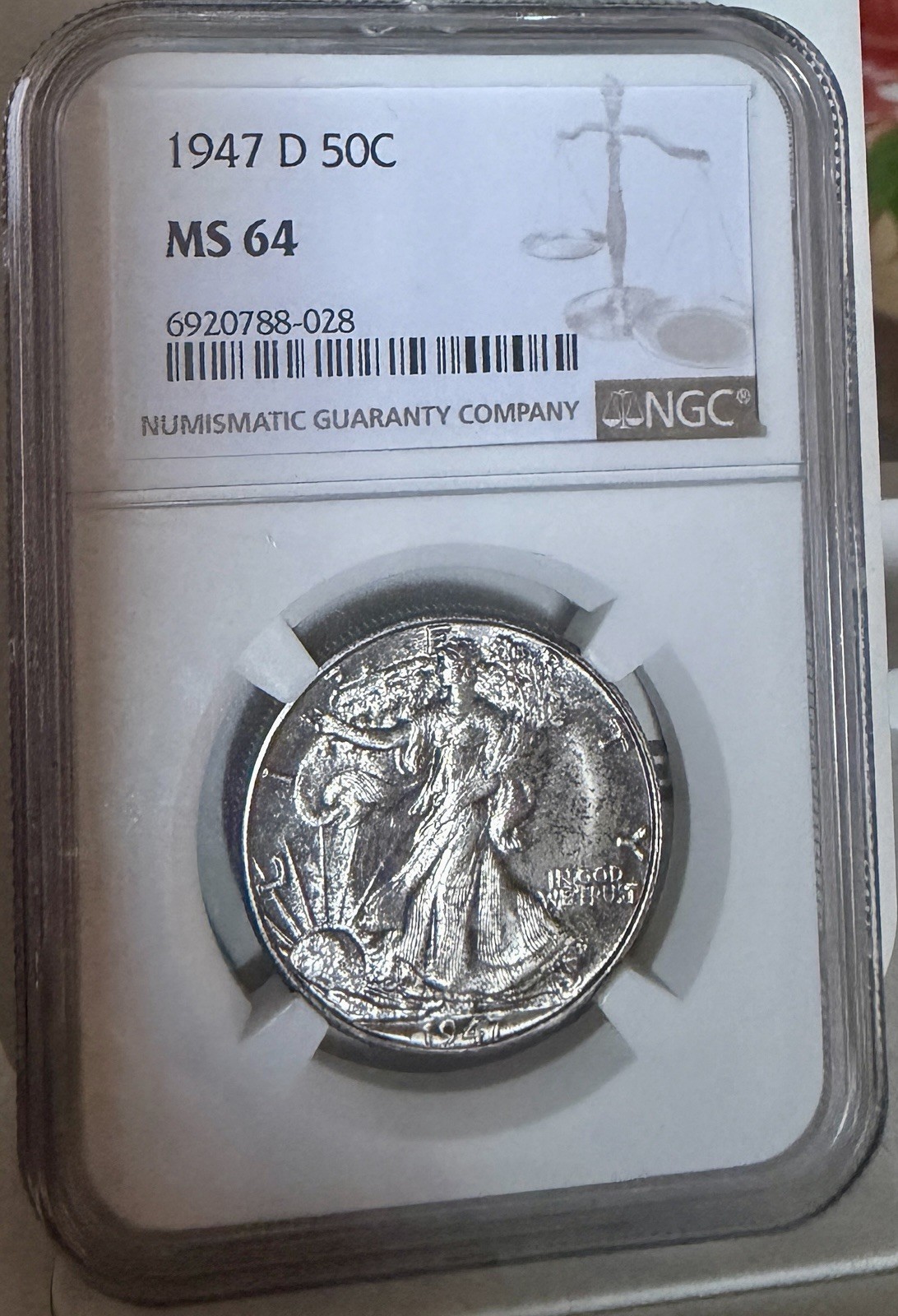 1947 D Walking Liberty, MS64- Luster Pops out strong from this Toned half Dollar