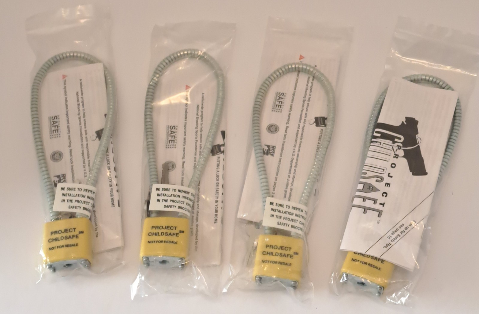 Child GUN SAFETY LOCKS Safe Firearm Metal Cable 2 Keys Each, NEW SET OF FOUR