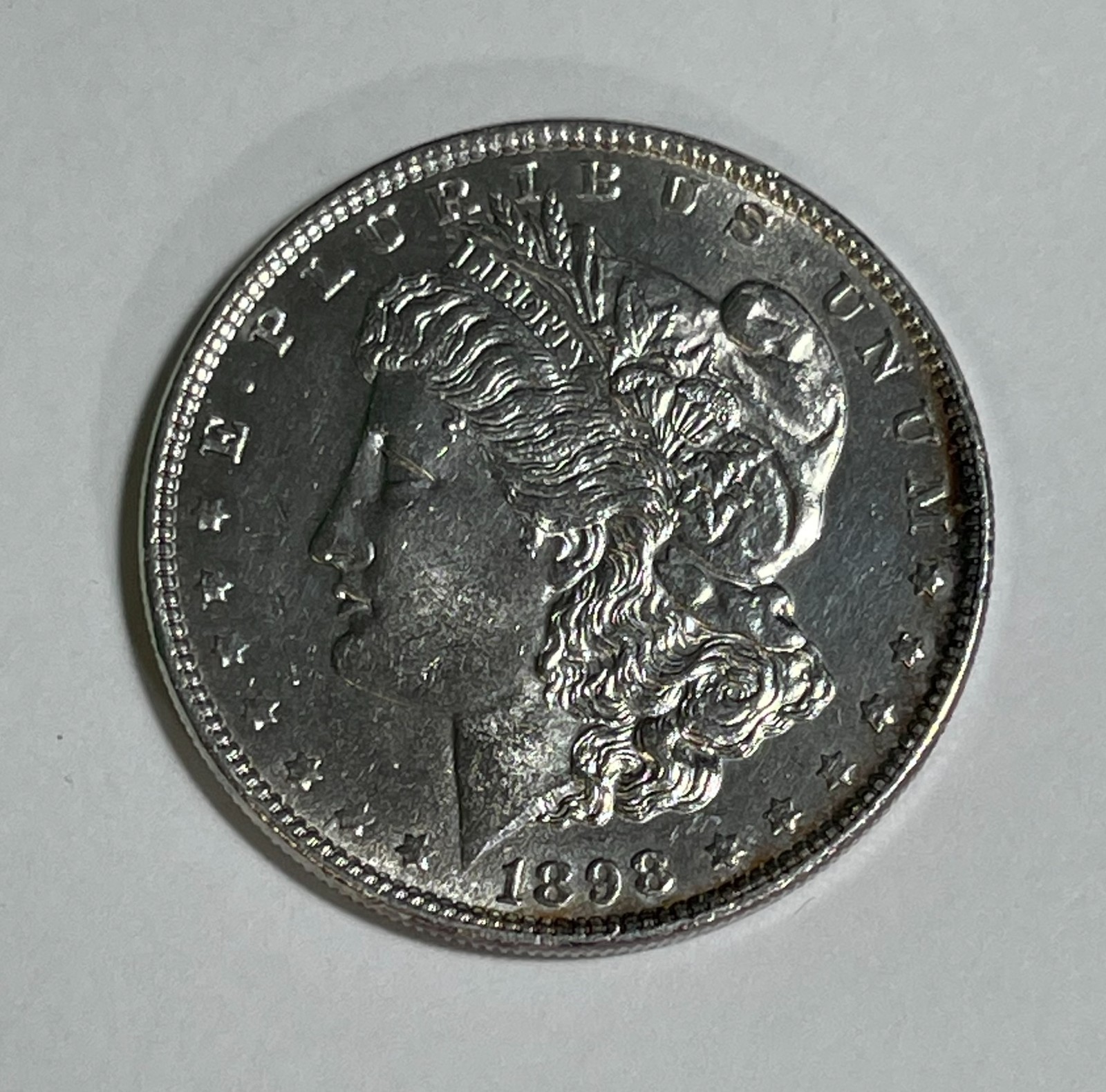 1898 Morgan dollar (#21817) BU P/L Rev. spot cleaned