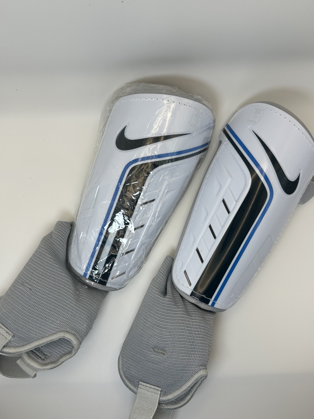 Nike Soccer Shin Guards ALL SIZES – Protective Adjustable Straps, White/Blue
