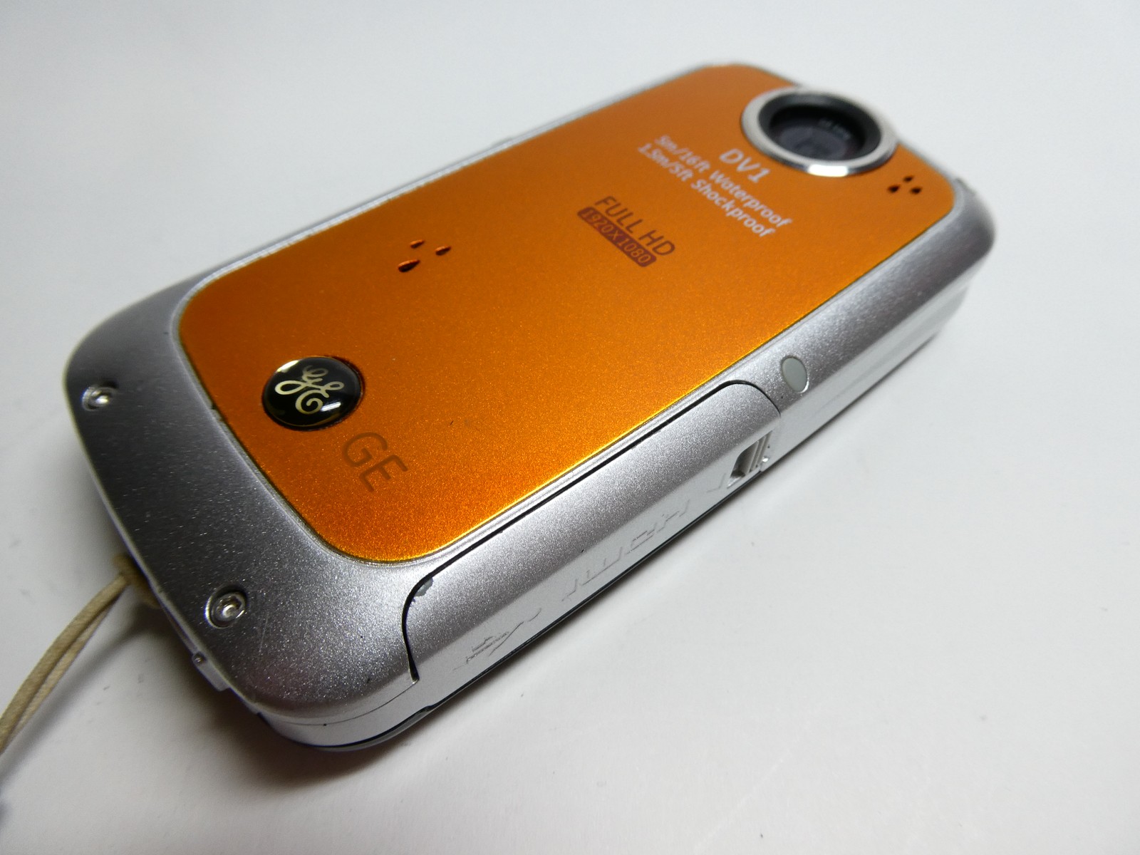 GE DV1 Orange Compact Handheld Full HD Water & Shock Proof Camcorder & 4GB SD