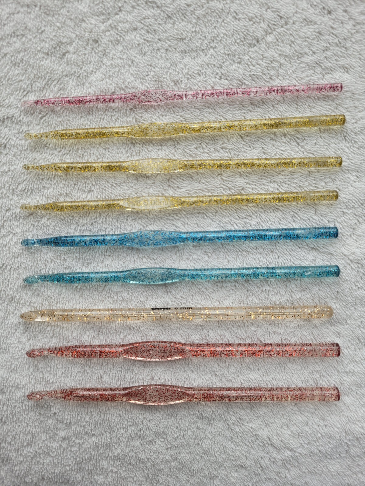 Preowned Set of 9 Glitter Tapered Plastic Crochet Hooks Sizes K,J, I,H, and G