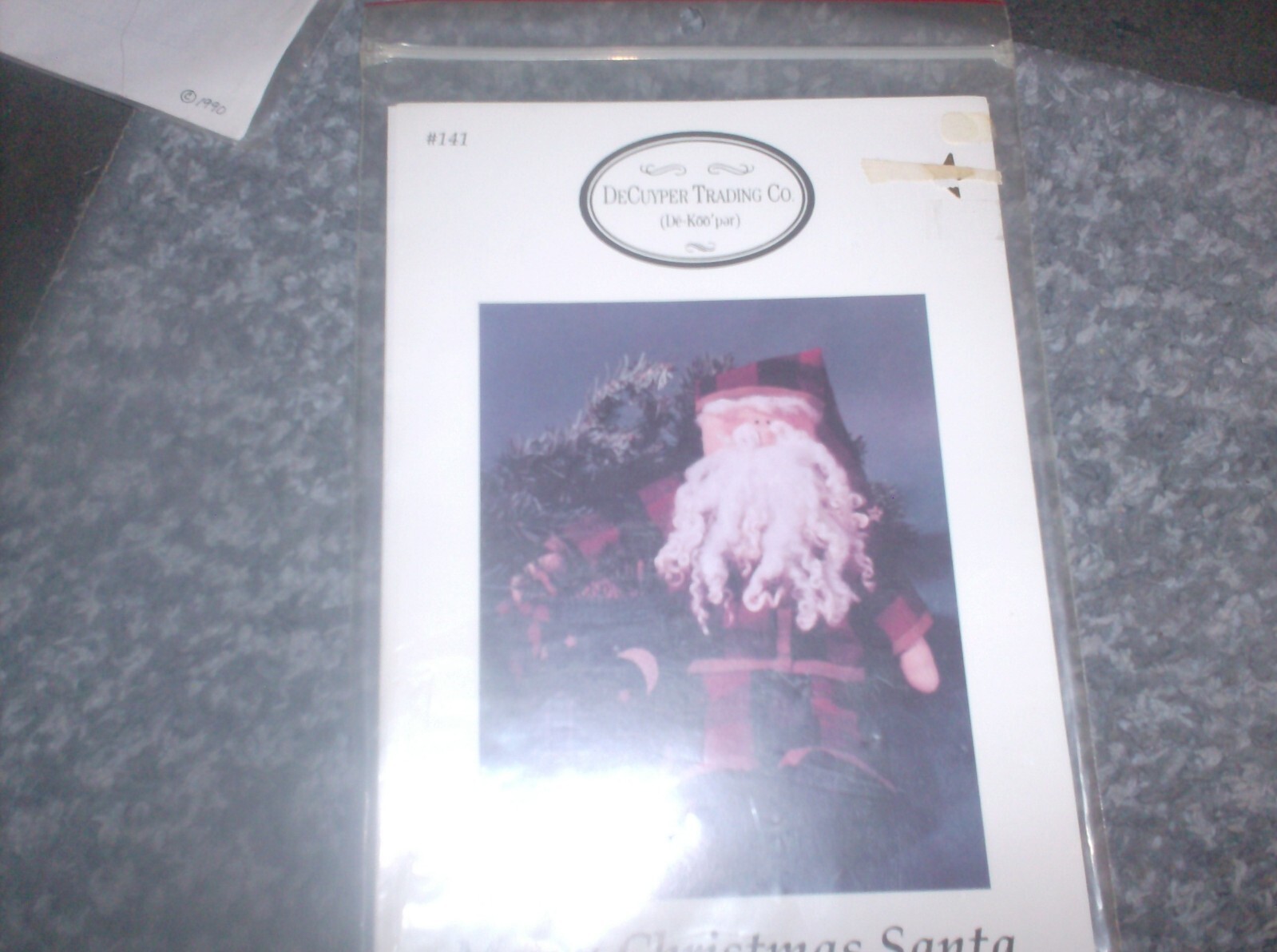 DeCuyper Trading Co. pattern #141 Merry Christmas Santa 12" with his pack  uncut
