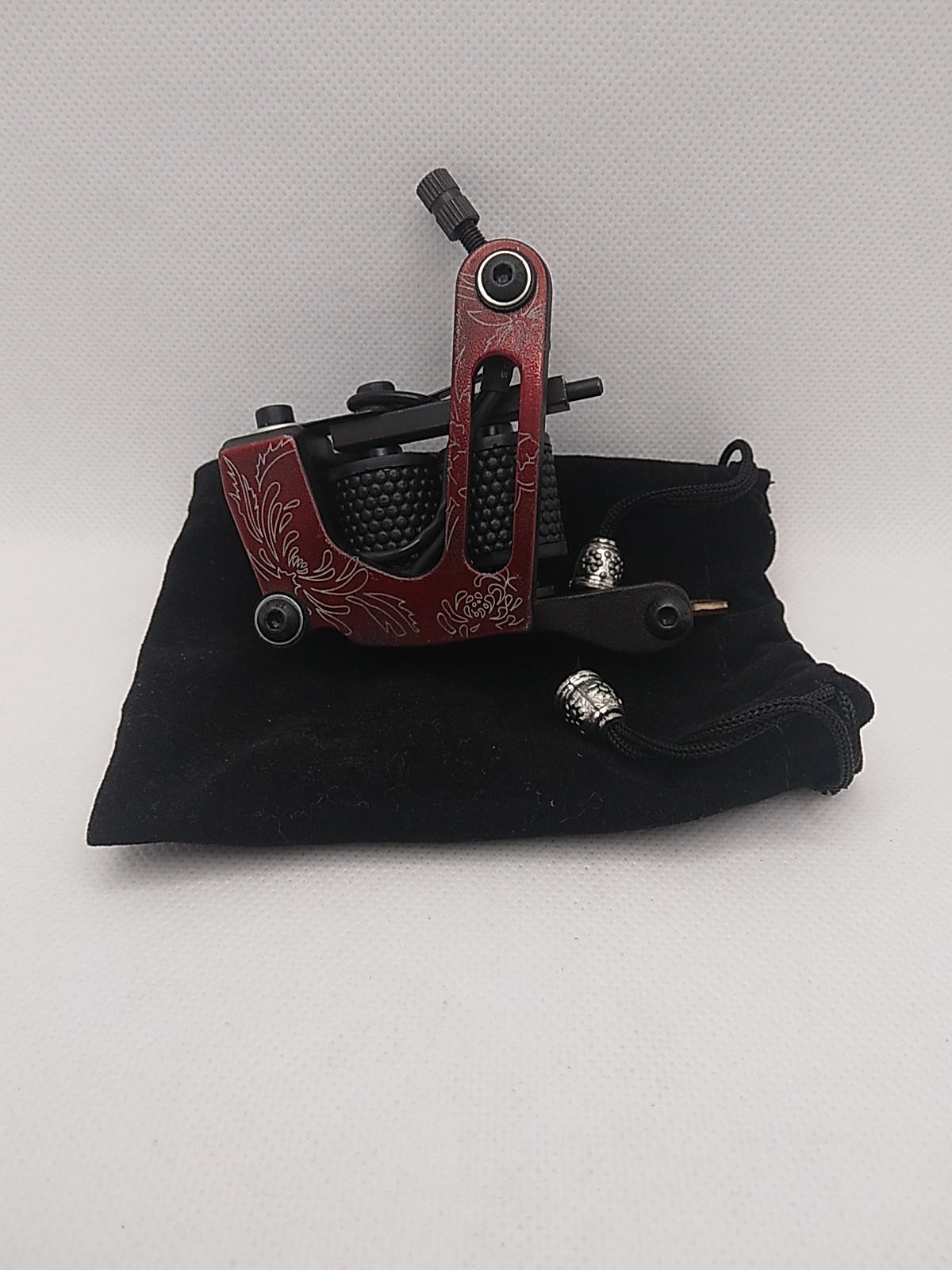 Red Coil Tattoo Machine with Engraved Design