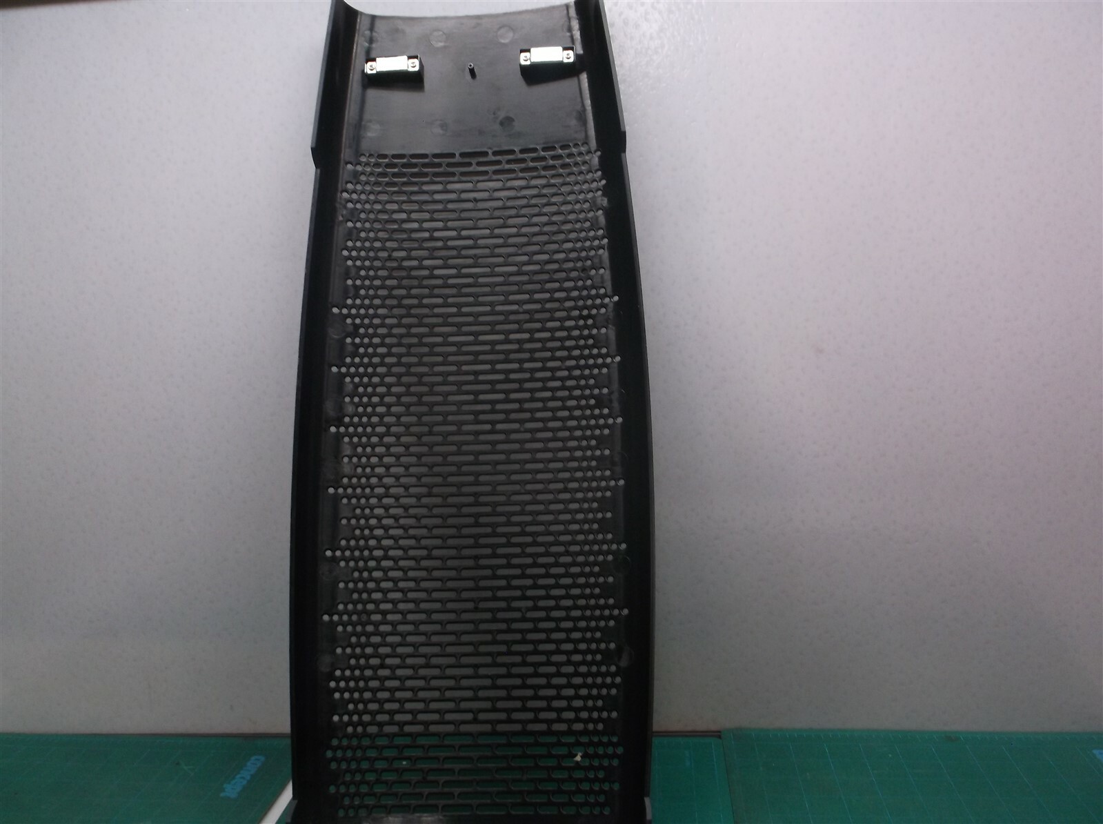 Black front grill off a Hunter Tall Tower Air Purifier hp600