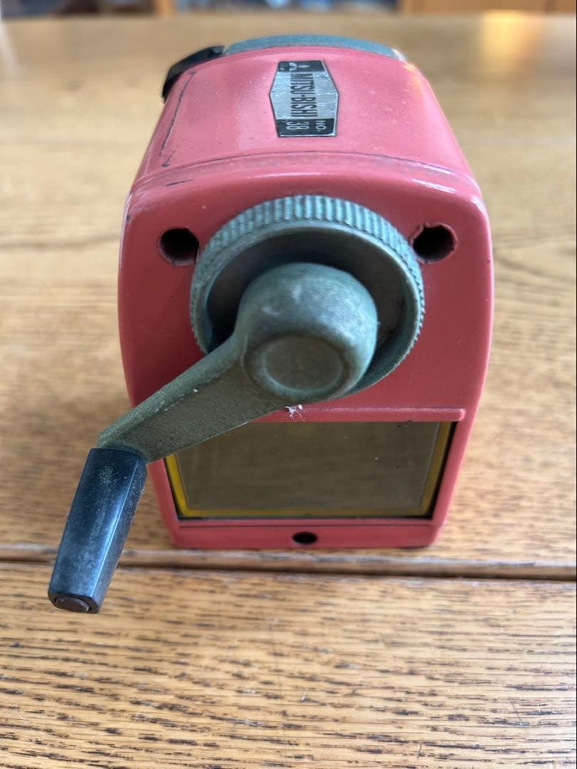 Vintage pink plastic manual pencil sharpener