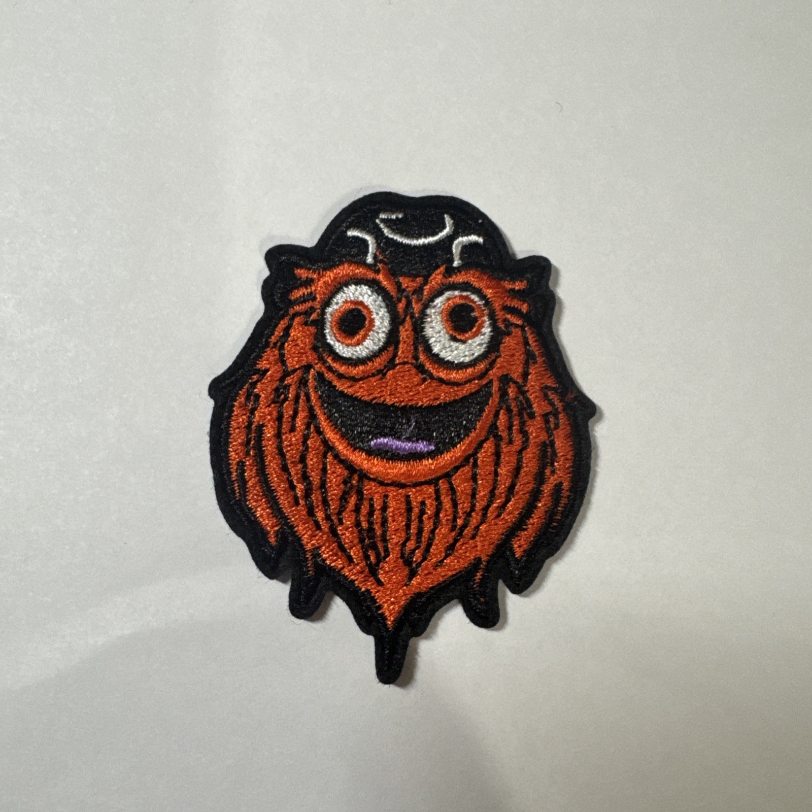 Gritty Embroidered Iron On Patch
