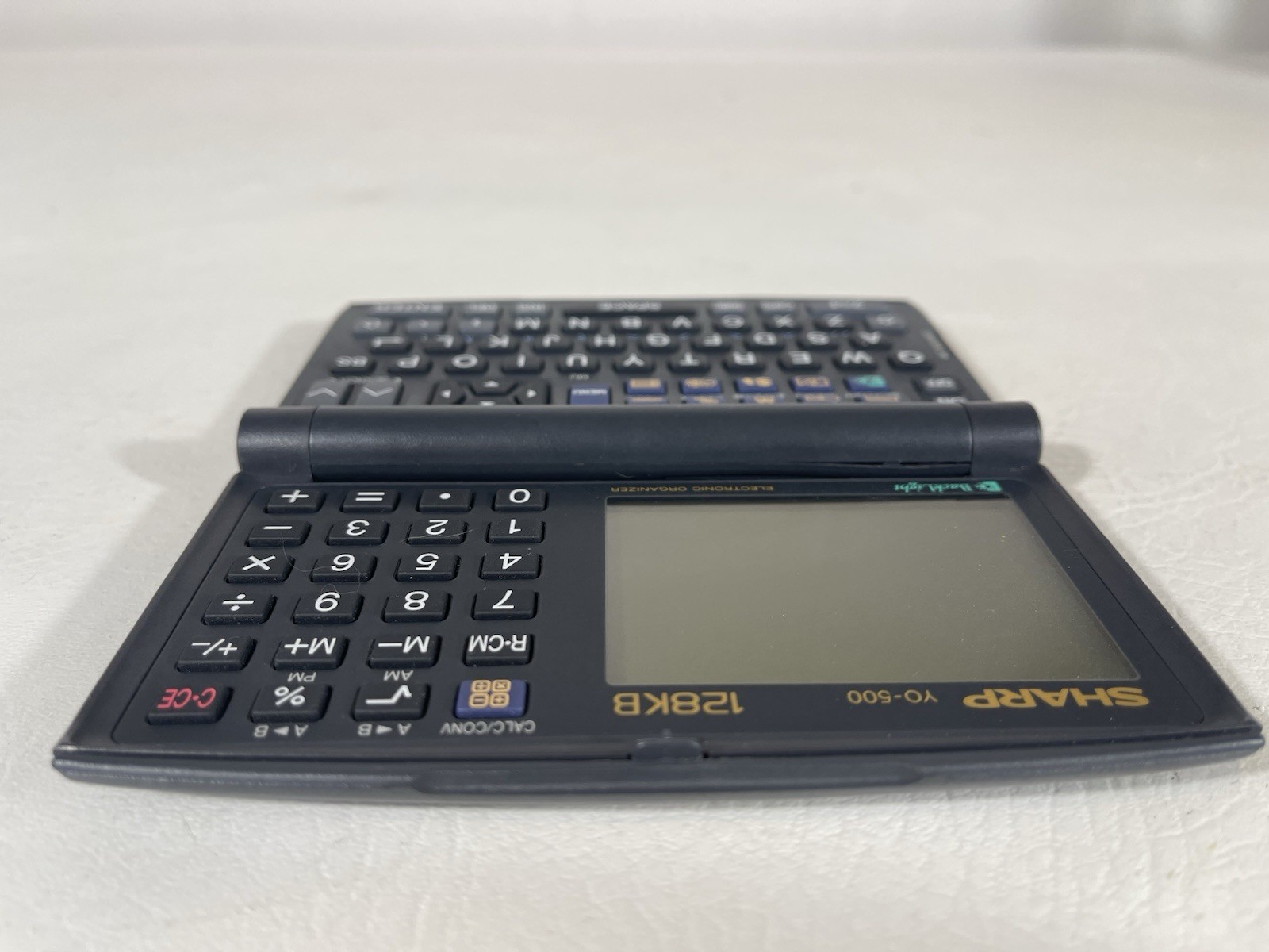 Sharp YO-500 Vintage Electronic Organizer with 128 KB memory Clean, Working!