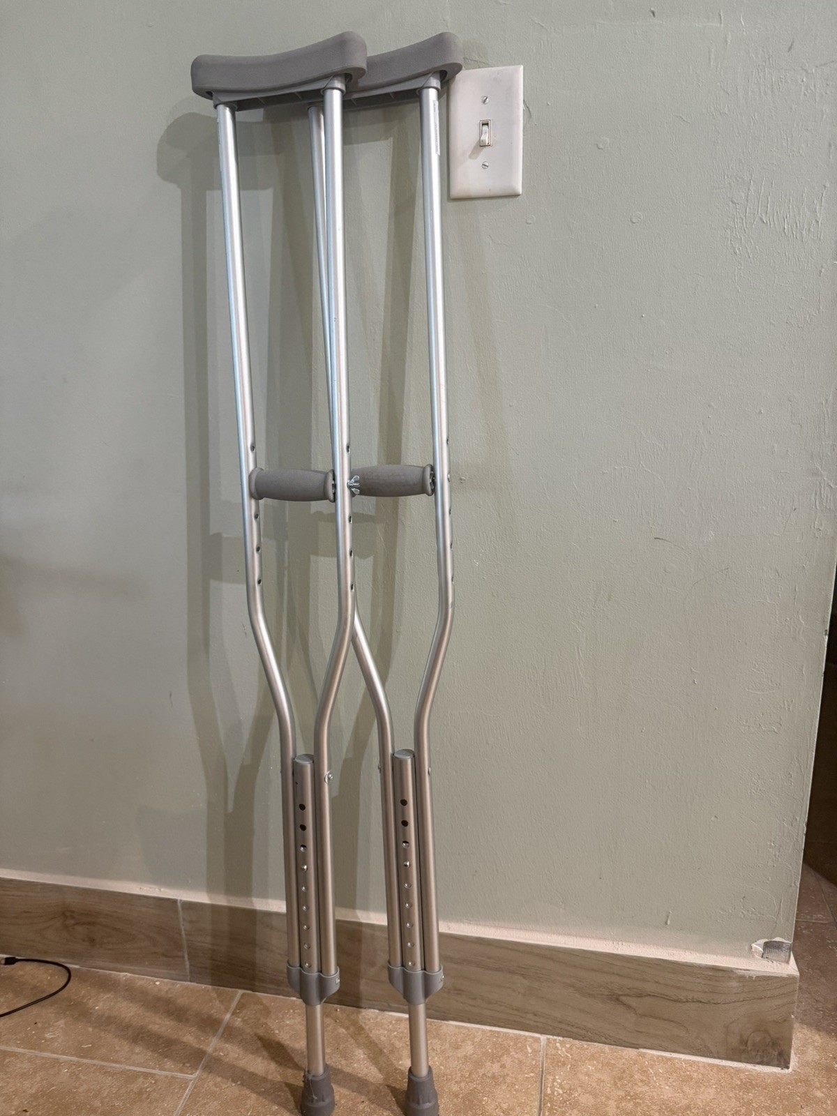 Adjustable height underarm crutch, stainless steel