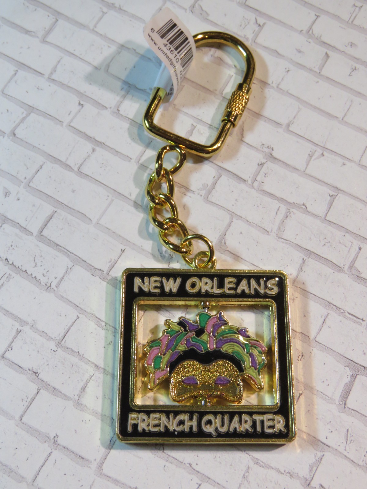 Gold Trim Metal Key Chain: New Orleans, LOUISIANA - Spinning Mardi Gras Mask