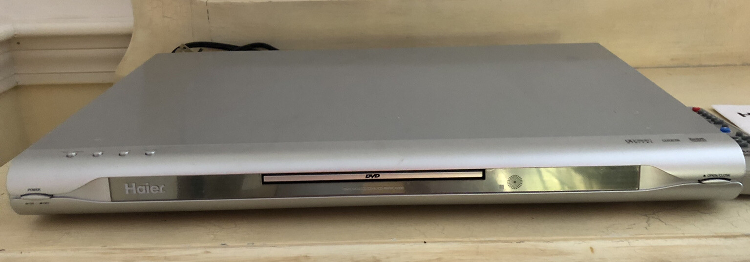 Haier  DVD Player  Model 101 with power cord, remote, manual