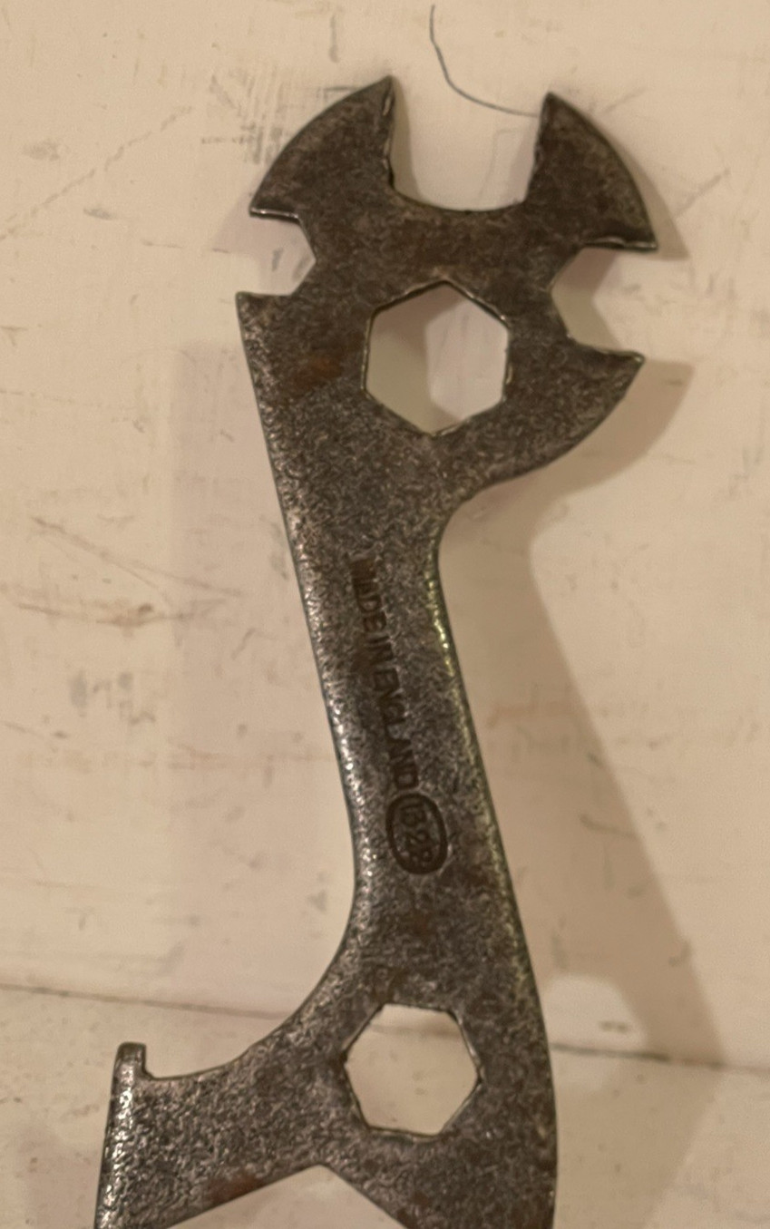 A vintage British mullti-use bicycle spanner