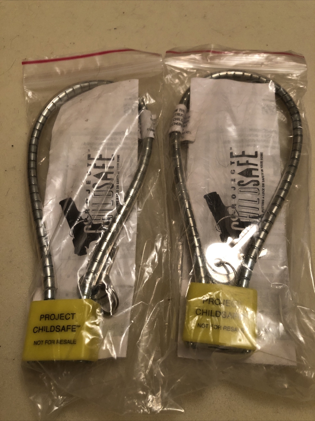 Qty 2 PROJECT CHILDSAFE Firearms-Guns-Weapons Cable Safety Lock Padlock Bin 09