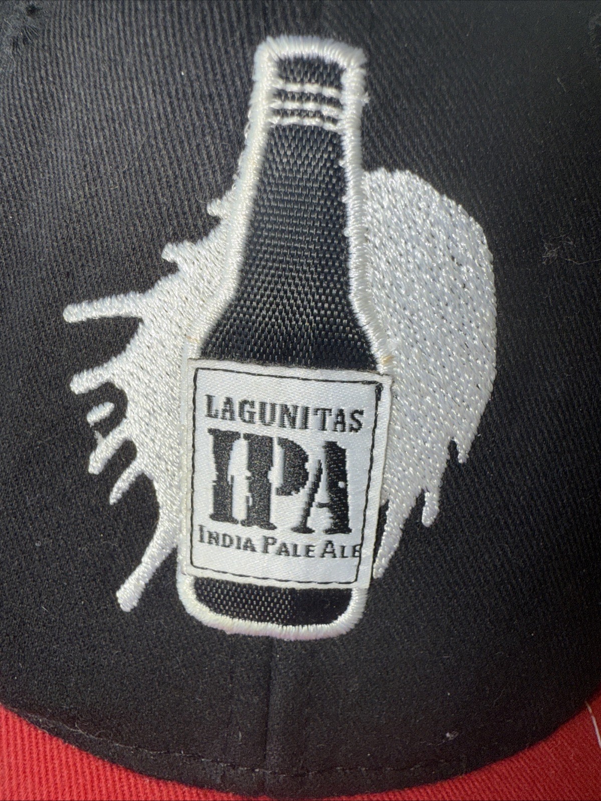 Lagunitas IPA India Pale Ale sparkle bottle patch on Black Hat Red bill Snapback