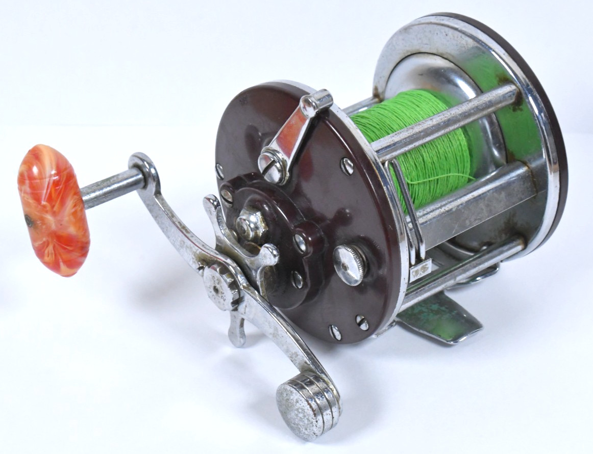 Vtg Penn Peer 209 Level Wind Ocean Fishing Reel Red/Orange & Creme Swirl Handle