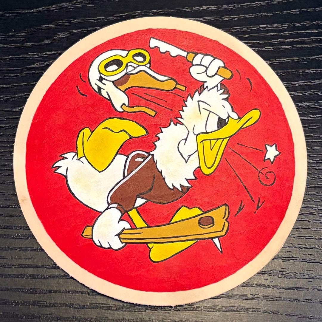 Hand-painted leather patch of the 309th Fighter Squadron, US military unit insig