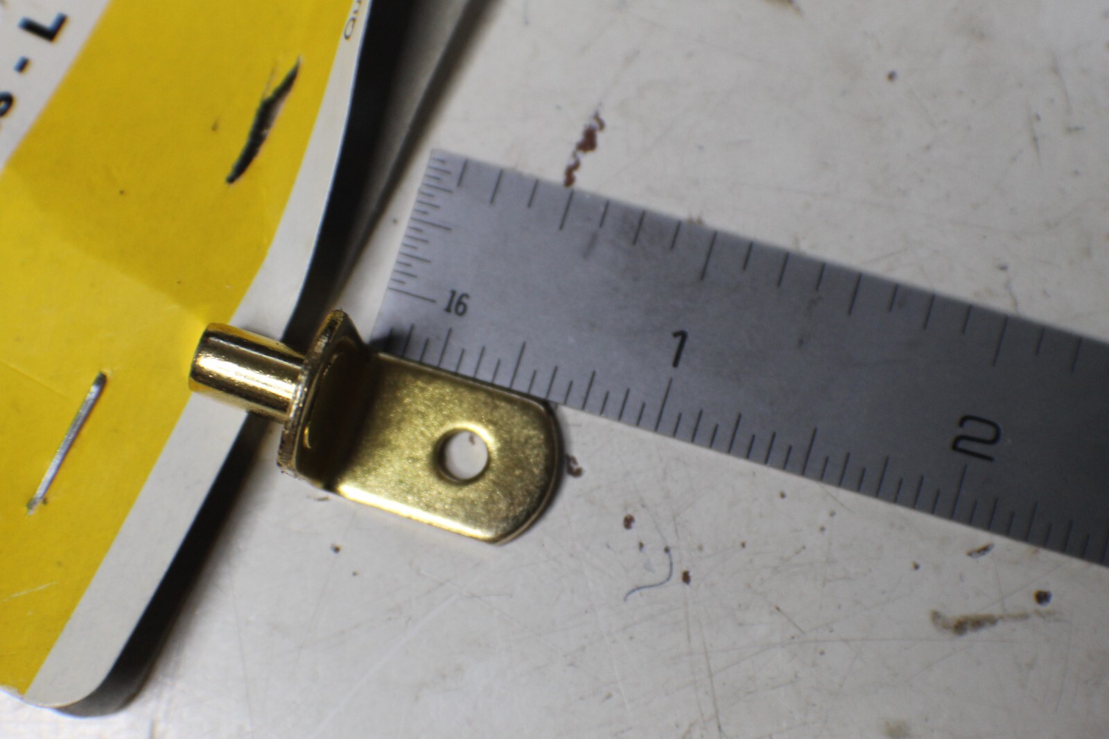 12 1/2" ~ L shaped shelf supports 1/4" hole