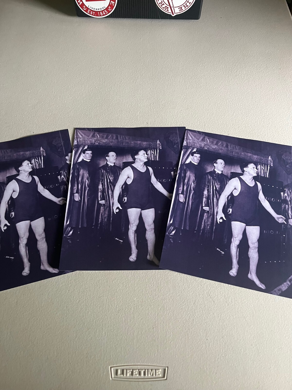 Harry Houdini has just escaped from the Water Torture cell, Rare reprint image!