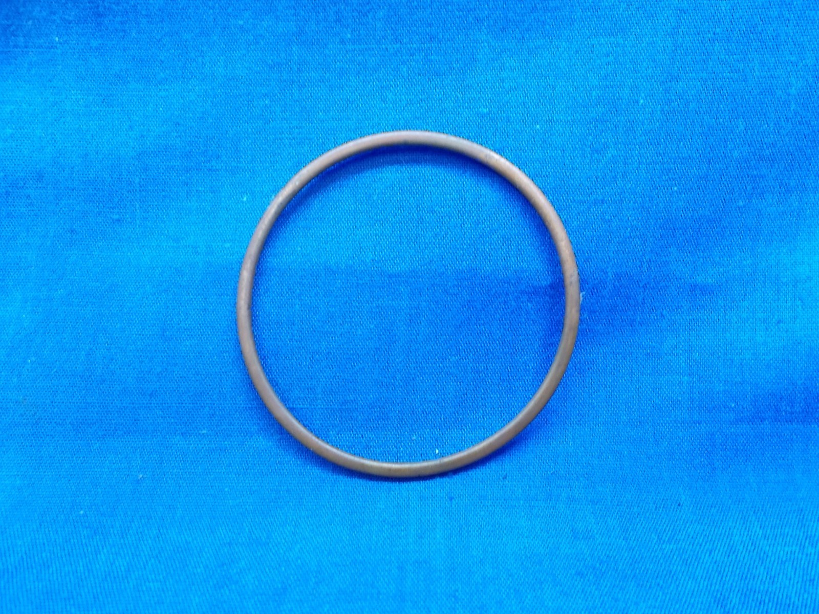 Kawasaki 11009-1124. OEM Exhaust Holder Gasket. Fits Kawasaki KX125(74-79).