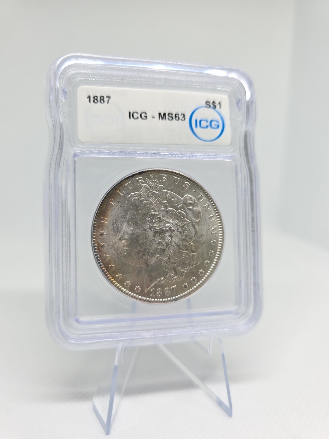 1887 Morgan Silver Dollar MS63 ICG NICE TONING