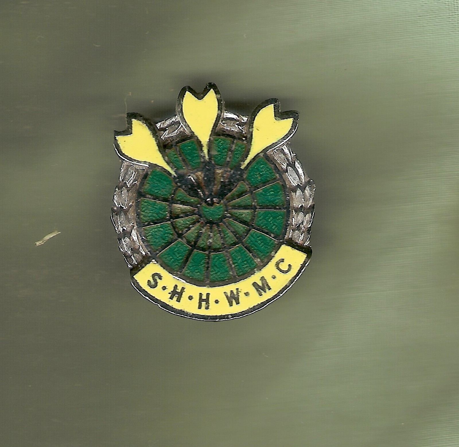 #D142.  S.H.H.W.M.C.  LAPEL BADGE WITH DARTS THEME