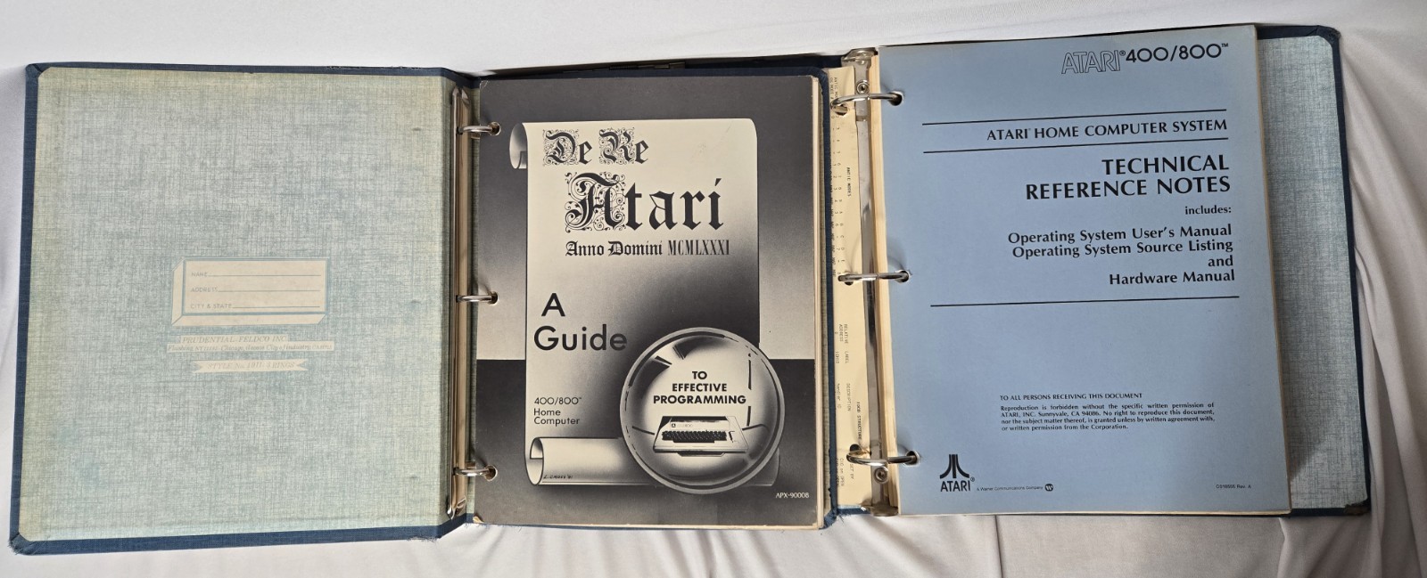 Set of original Atari 400/800 technical documentation housed in a vintage 3-ring
