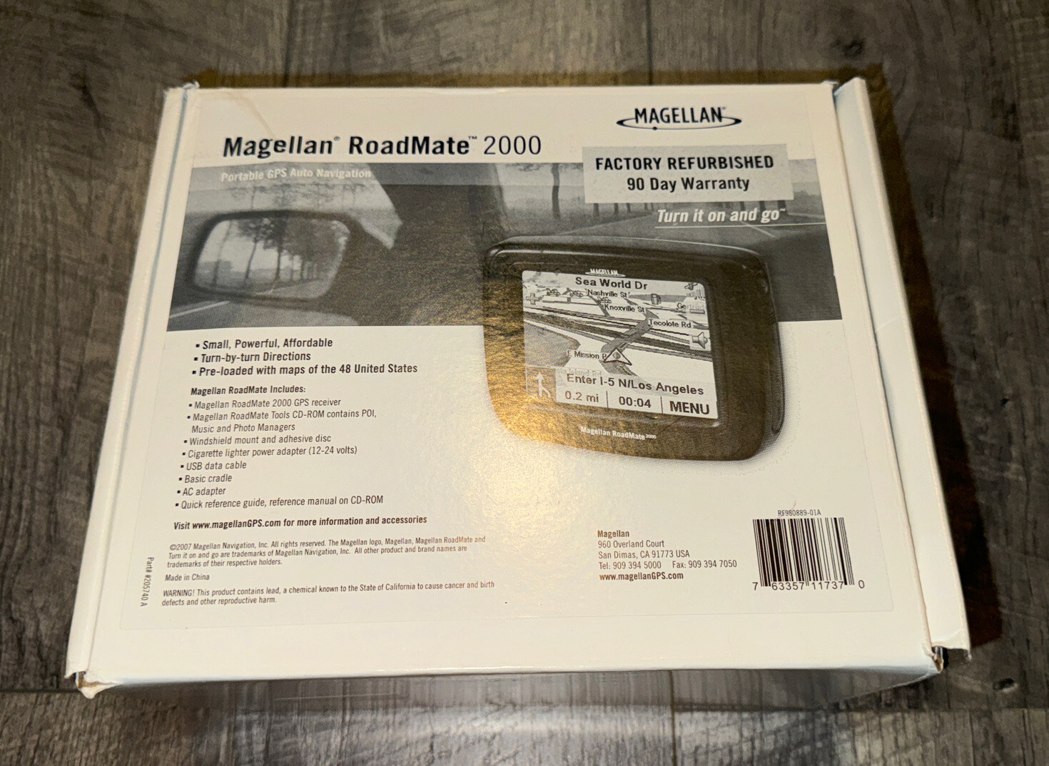 Magellan RoadMate 2000 GPS w/ Car Charger, Manual, Software, & Windshield Mount